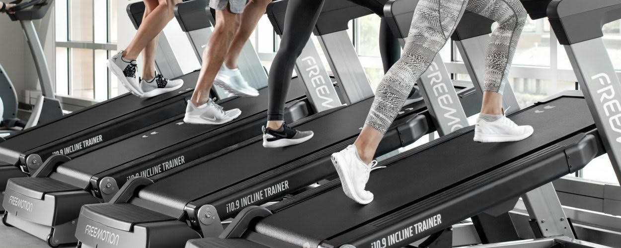 Miami Athletic Club women using treadmills